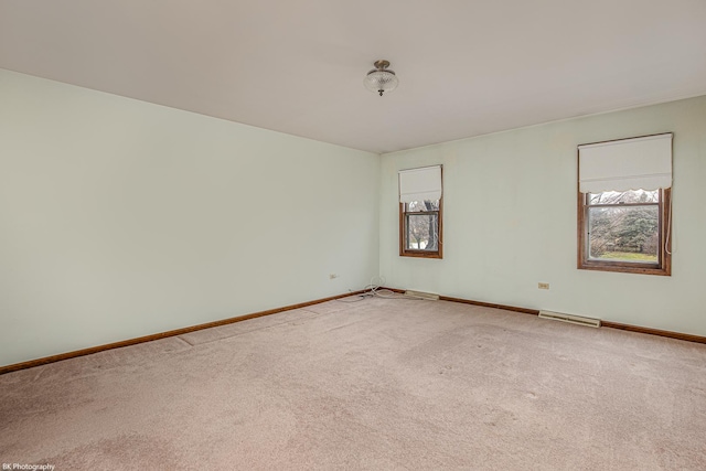 spare room with carpet floors