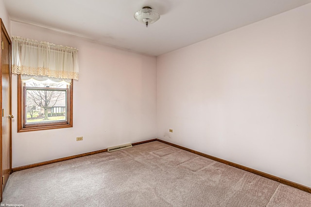 view of carpeted spare room