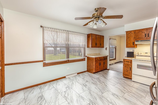 kitchen featuring ceiling fan and white range with electric stovetop