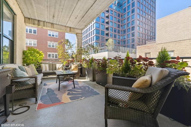 balcony with a patio and an outdoor hangout area