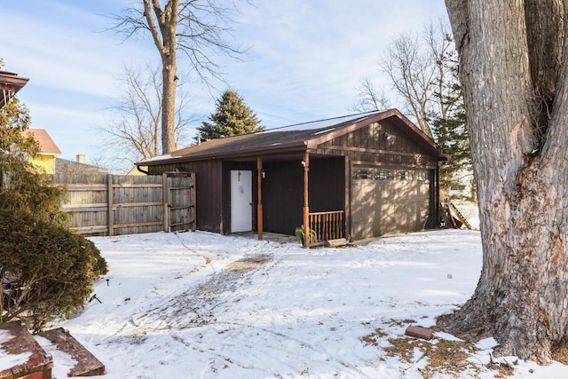 view of snow covered garage