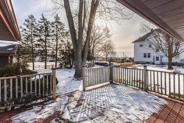 view of snow covered deck