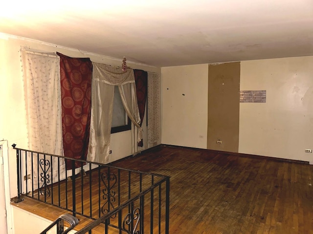 empty room with wood-type flooring