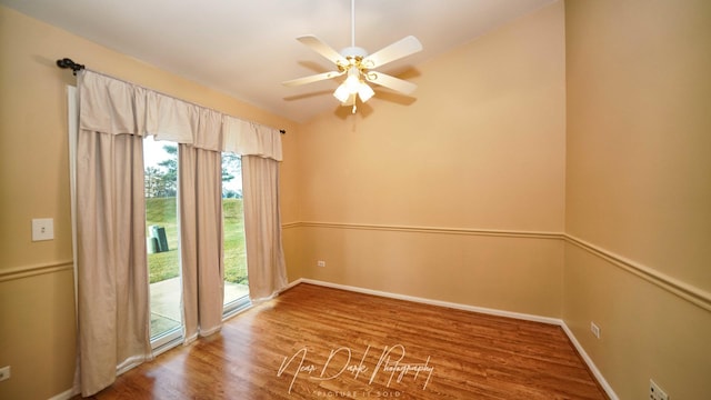 spare room featuring hardwood / wood-style flooring and ceiling fan