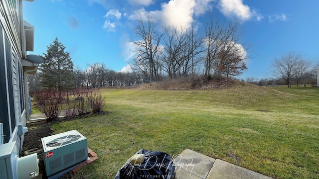 view of yard featuring central AC