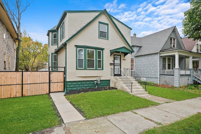 view of front of home with a front lawn