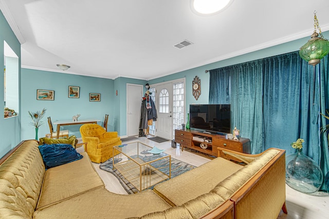 living room with crown molding and french doors