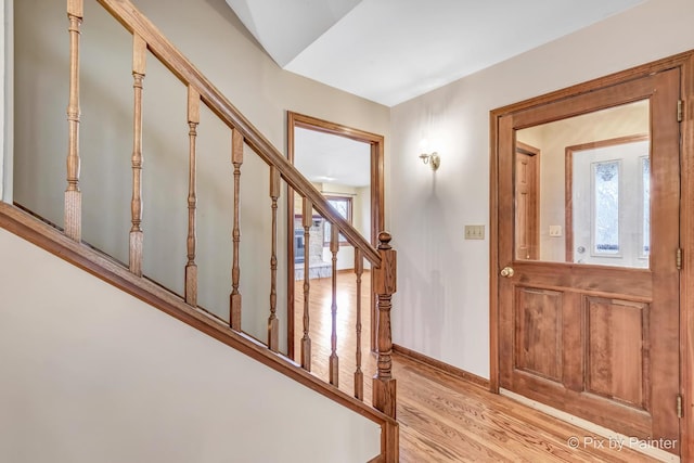 foyer with light wood-type flooring