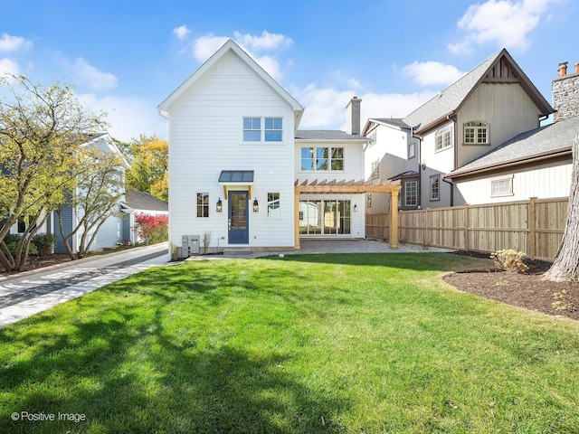 rear view of house featuring a lawn, central air condition unit, and a pergola