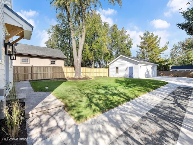 view of yard with an outdoor structure and a patio area