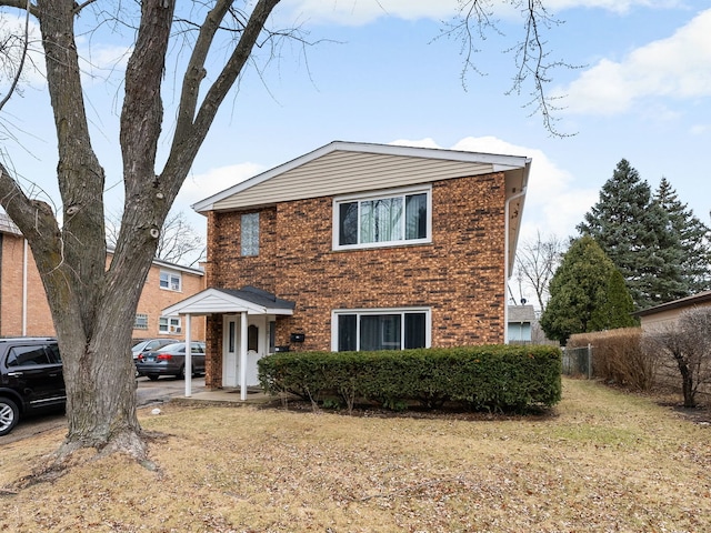 view of front facade with a front lawn