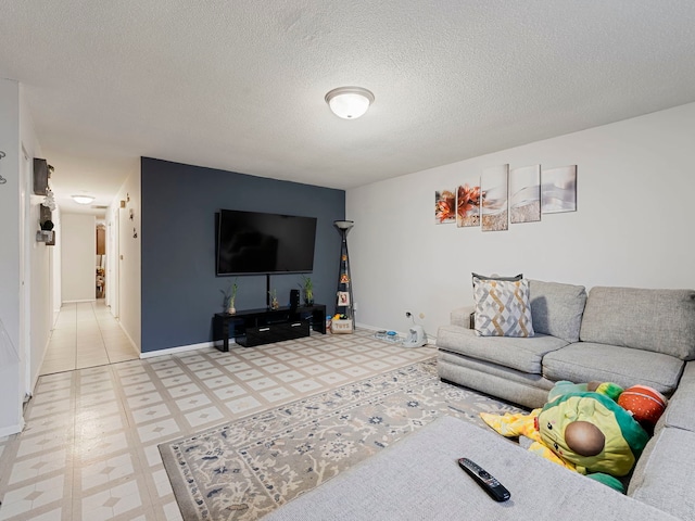 living room with a textured ceiling