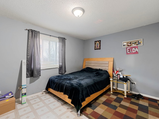 bedroom with a textured ceiling