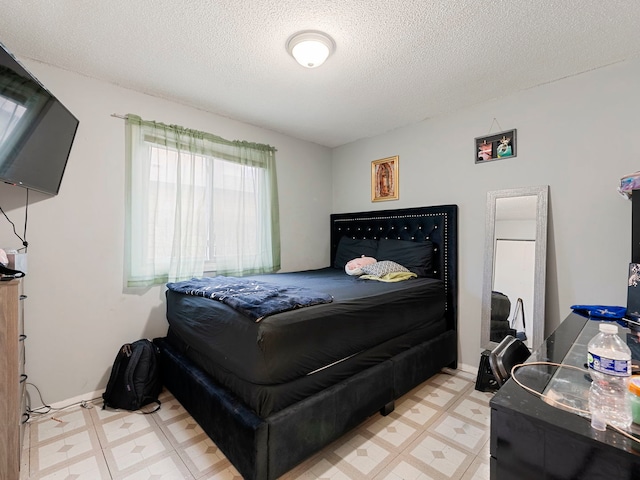 bedroom with a textured ceiling