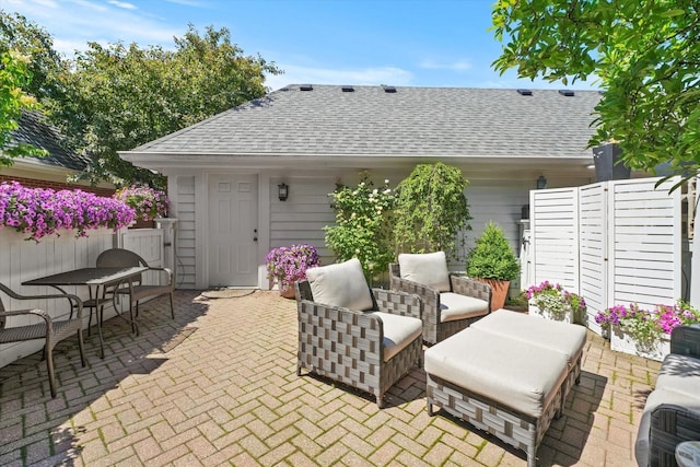 view of patio featuring fence