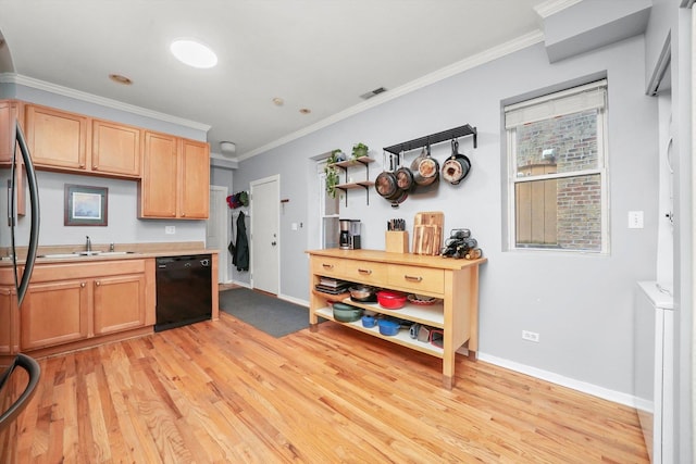 kitchen with dishwasher, ornamental molding, sink, and light hardwood / wood-style floors