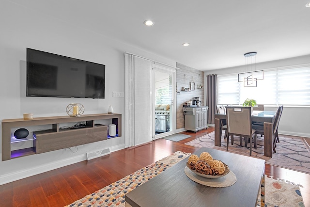 living room with hardwood / wood-style floors