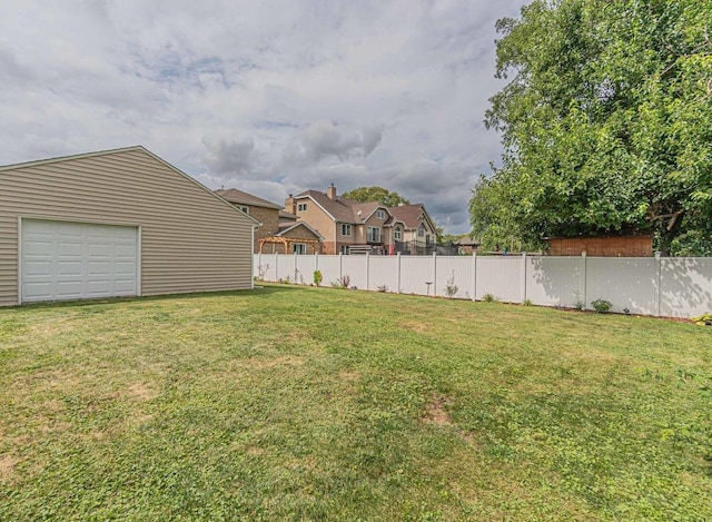 view of yard with a garage