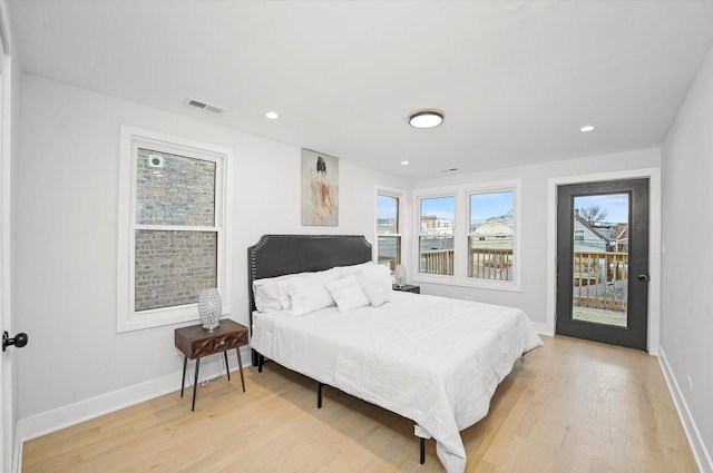 bedroom featuring baseboards, visible vents, access to exterior, light wood-type flooring, and recessed lighting