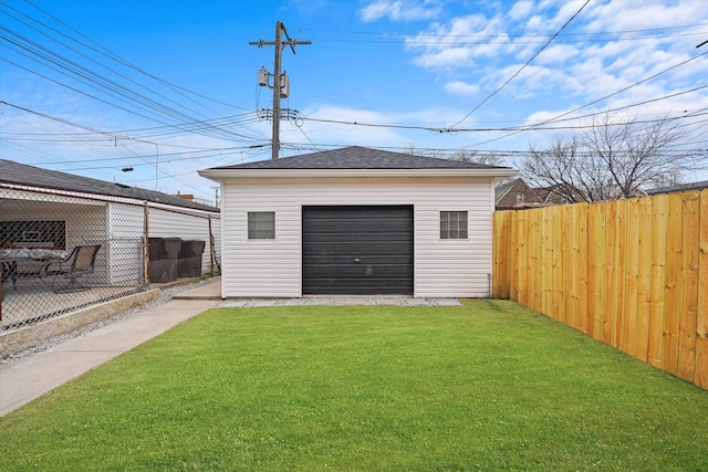 view of outbuilding featuring an outdoor structure and fence