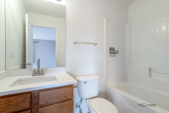 full bathroom with washtub / shower combination, vanity, and toilet