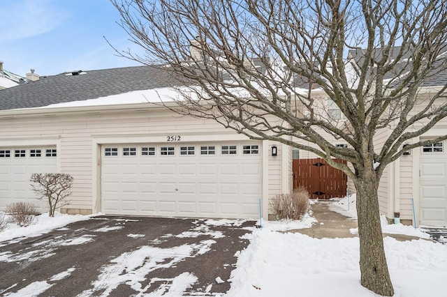 view of snow covered garage