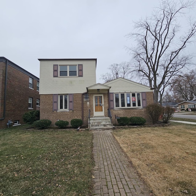 front of property featuring a front lawn