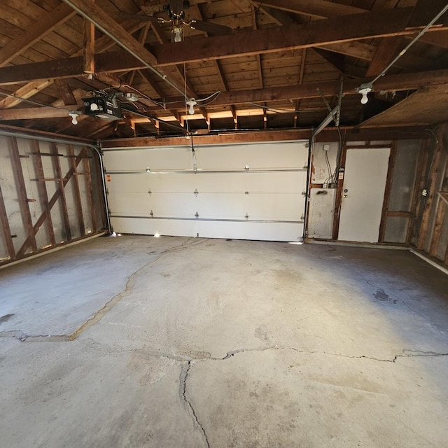 garage featuring a garage door opener