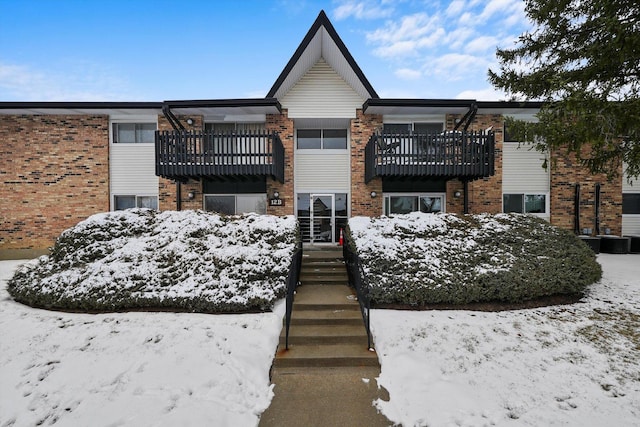 view of snow covered property