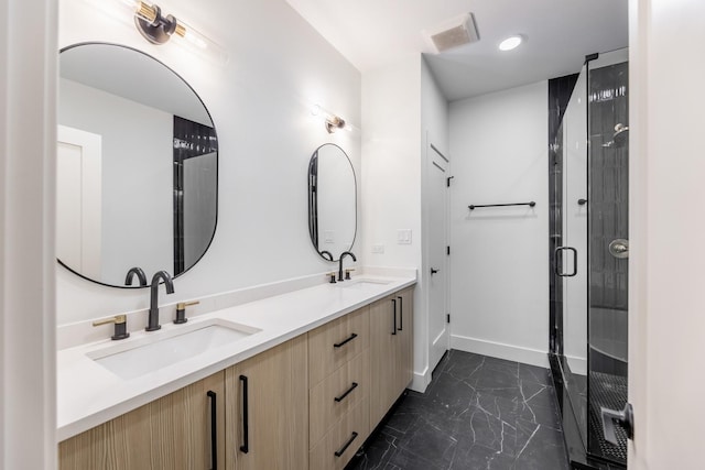 bathroom featuring walk in shower and vanity