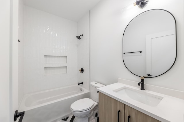 full bathroom with vanity, toilet, and tiled shower / bath combo