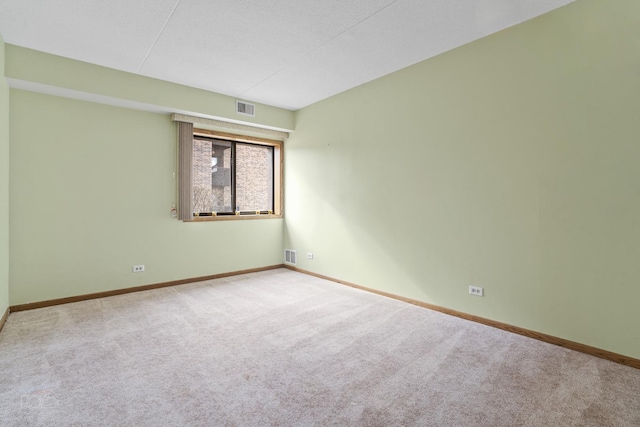 empty room with light carpet