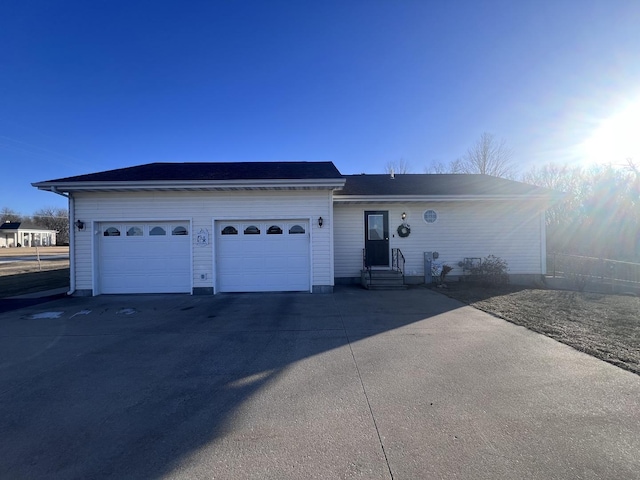 single story home featuring a garage