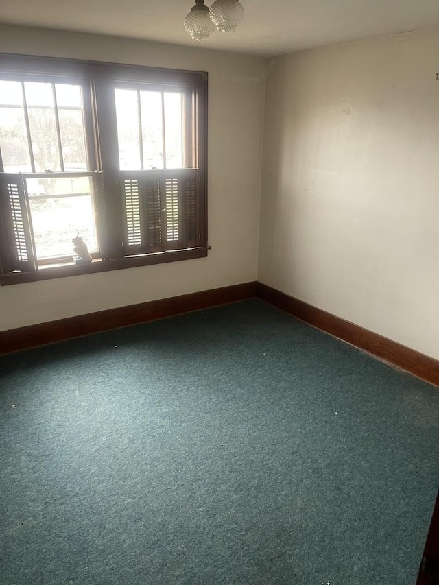 unfurnished room with carpet floors