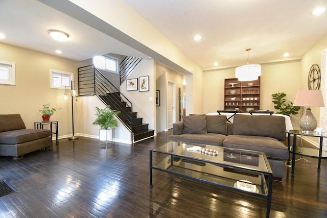 living room with dark hardwood / wood-style floors