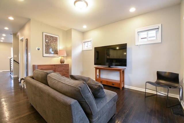 living room with dark hardwood / wood-style floors