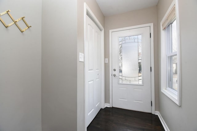 doorway to outside featuring dark hardwood / wood-style flooring