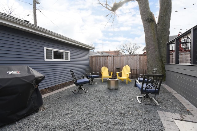 view of patio / terrace featuring grilling area and an outdoor fire pit