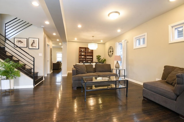 living room featuring dark hardwood / wood-style floors