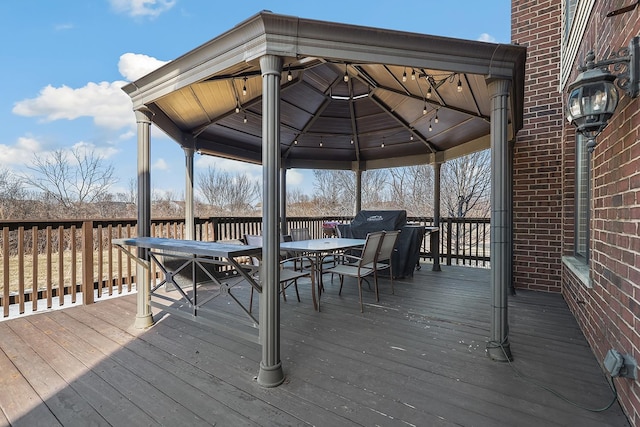 deck with outdoor dining space