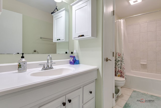 full bathroom with tile patterned flooring, toilet, vanity, and shower / bath combo with shower curtain