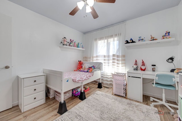 bedroom featuring ceiling fan and light hardwood / wood-style flooring