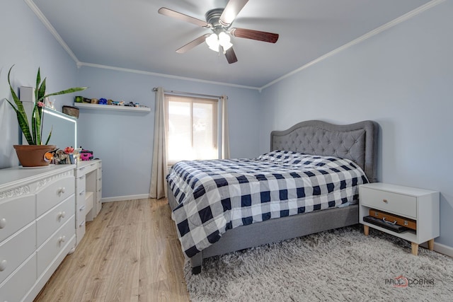 bedroom featuring ceiling fan, ornamental molding, and light wood-type flooring