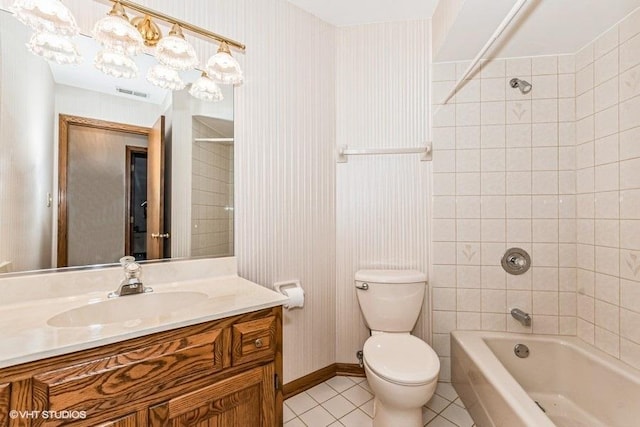 full bathroom with visible vents, toilet, vanity, tile patterned floors, and shower / bathtub combination