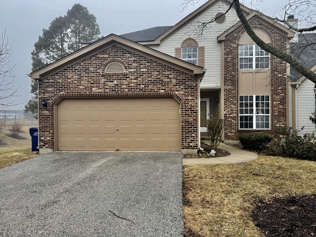 view of front property with a garage