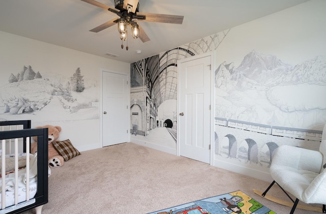 bedroom featuring ceiling fan and carpet floors