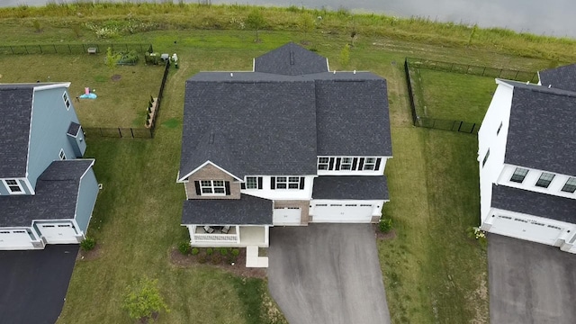 birds eye view of property featuring a rural view