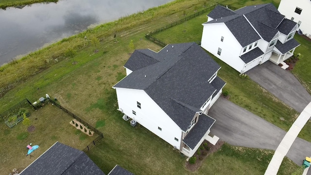 bird's eye view with a water view