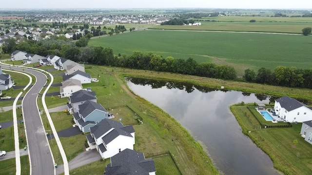 bird's eye view featuring a rural view and a water view