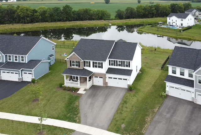 bird's eye view with a water view